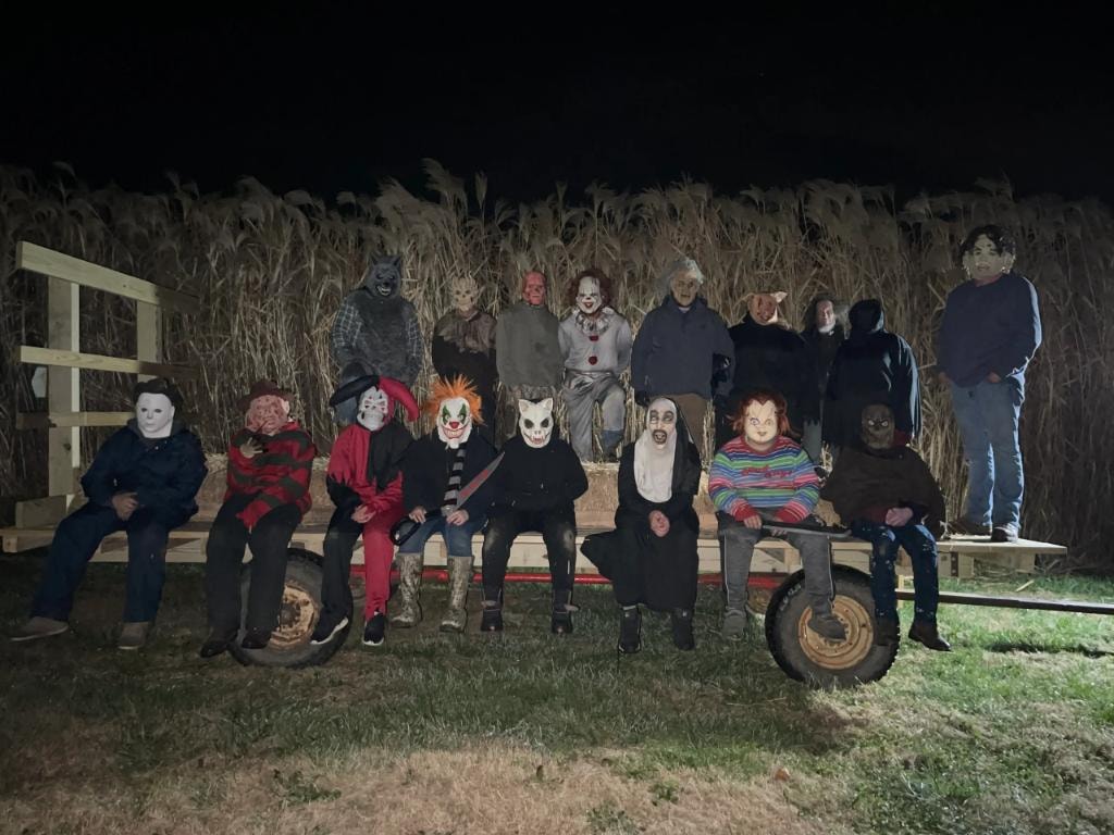Costumed performers gathered at the haunted trail
